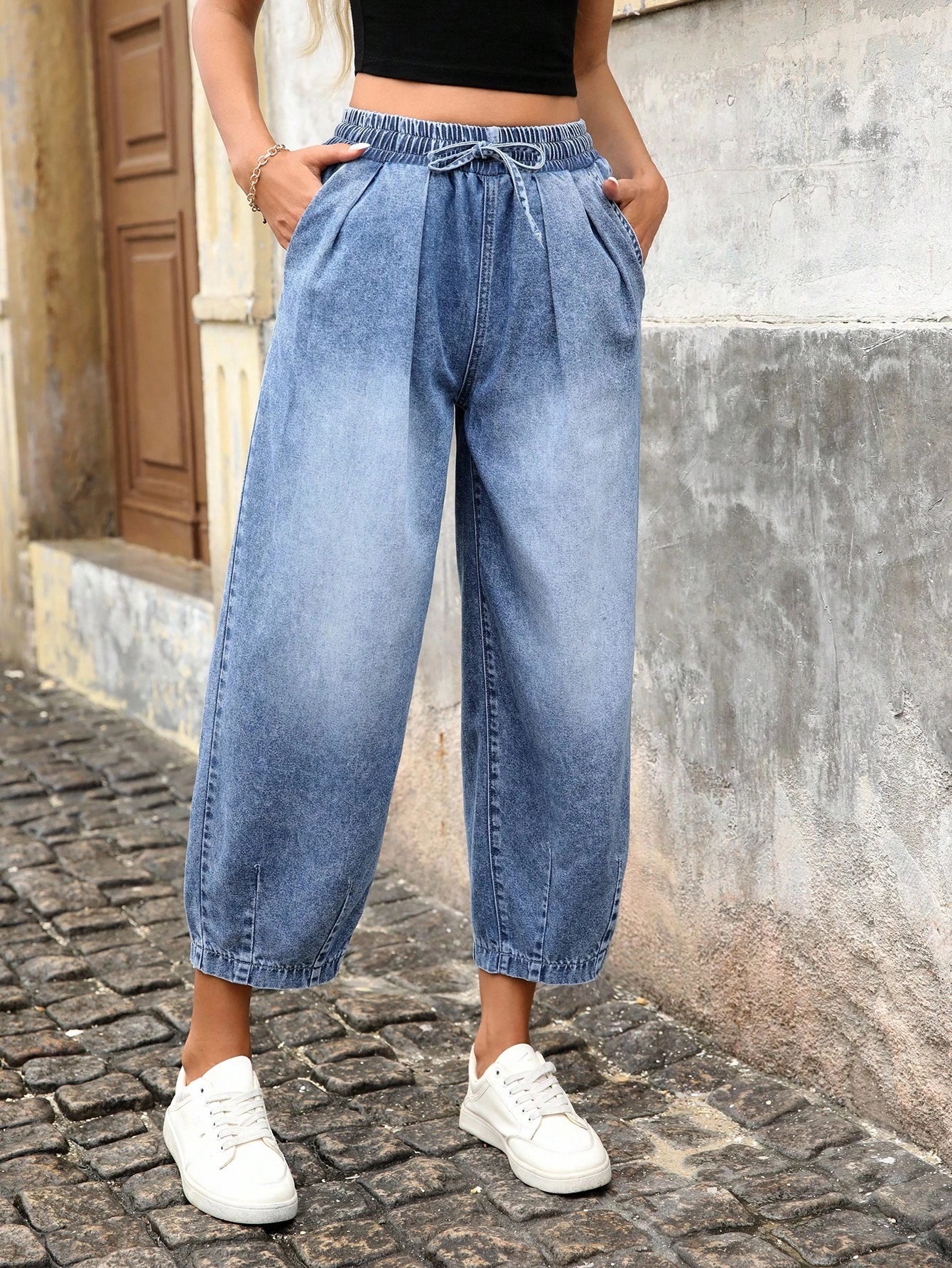 European size women's high-waisted tapered wide-leg jeans with pleated design, casual elastic waistband, and loose fit 0c