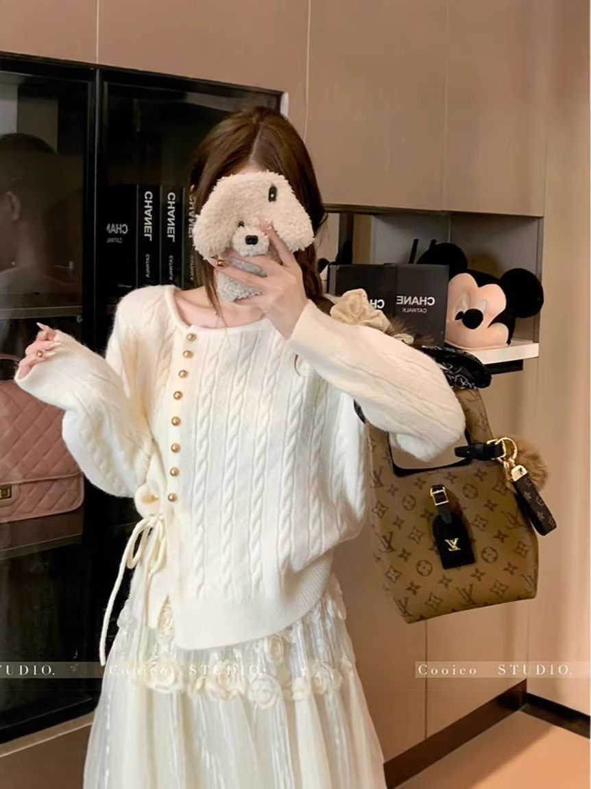 Trendy, niche, effortlessly chic long-sleeved knit cardigan women, featuring twisted design, perfect for spring autumn, with tie waist to create a s