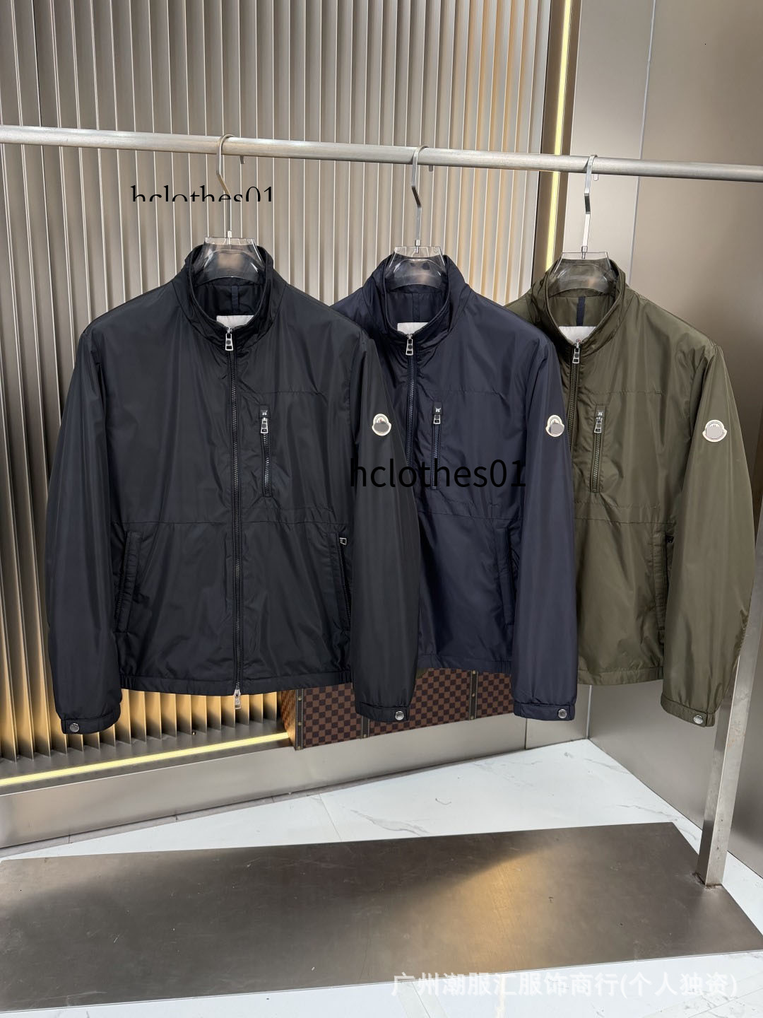 Light luxury M-brand stand-up collar windproof thin jacket for men with round badge sleeve, pocket, and lettering on the back, casual coat