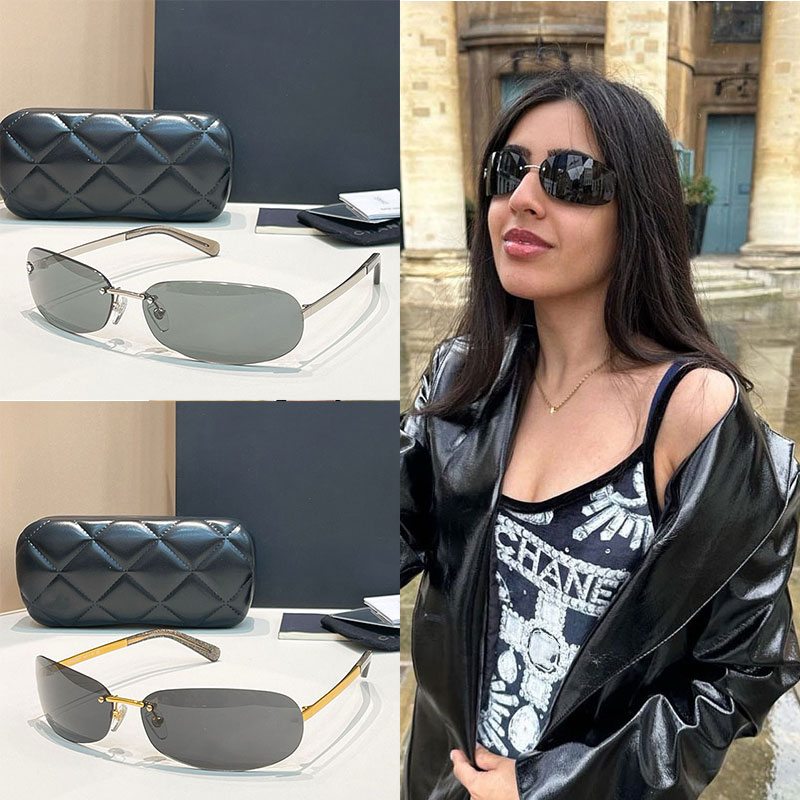 women fashionable frameless sunglasses Silver metal mirror legs Oval gray lens Front diamond logo design Ladies College Official Occasion Luxury Sun