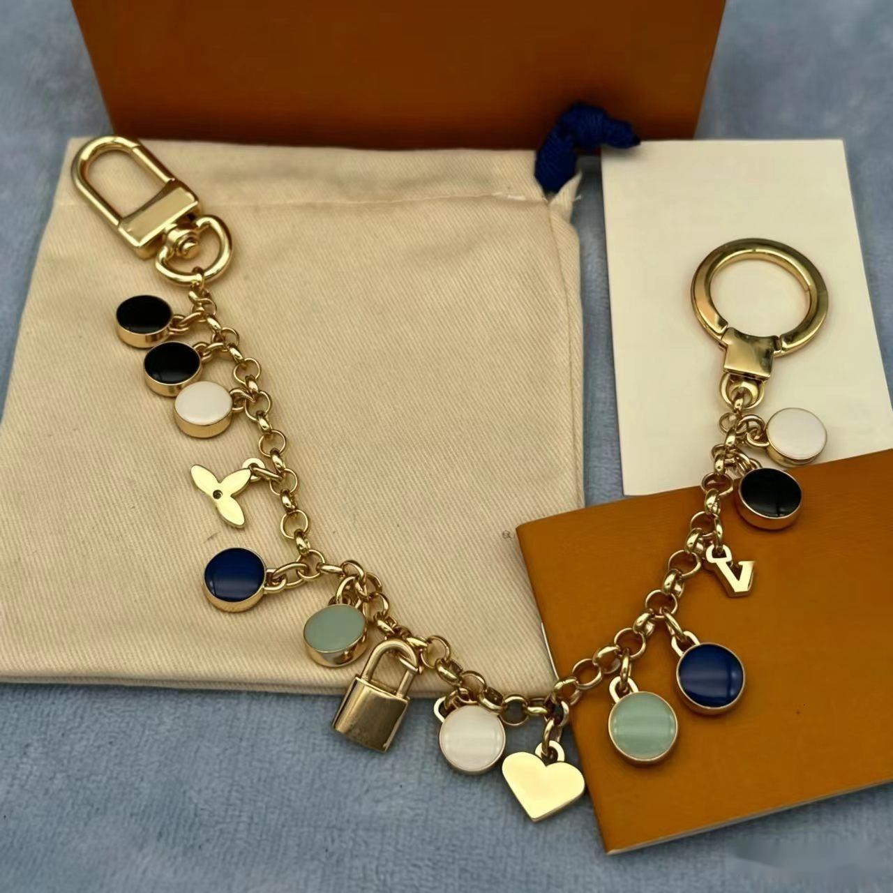 Keychains Lanyards 2026Latest hot models New Keychain Chocolate keychain Premium Leather Aluminum Designer Key Chain Holder Stylish Keyring Jewelry