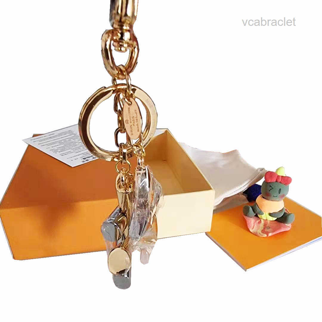 Designer high qualtiy brand Aolly Keychain Fashion Pendant Car Chain Charm Brown Flower Mini Bag KeyringTrinket Gifts Accessories with box