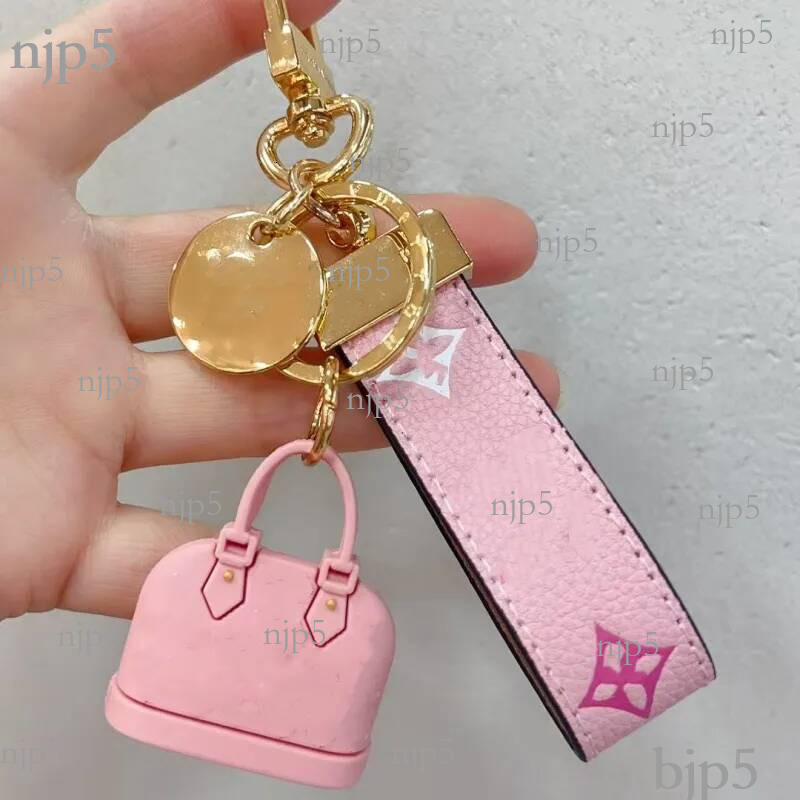 Luxury designer mini bag key chain teenage fashion L keychain couple pendant