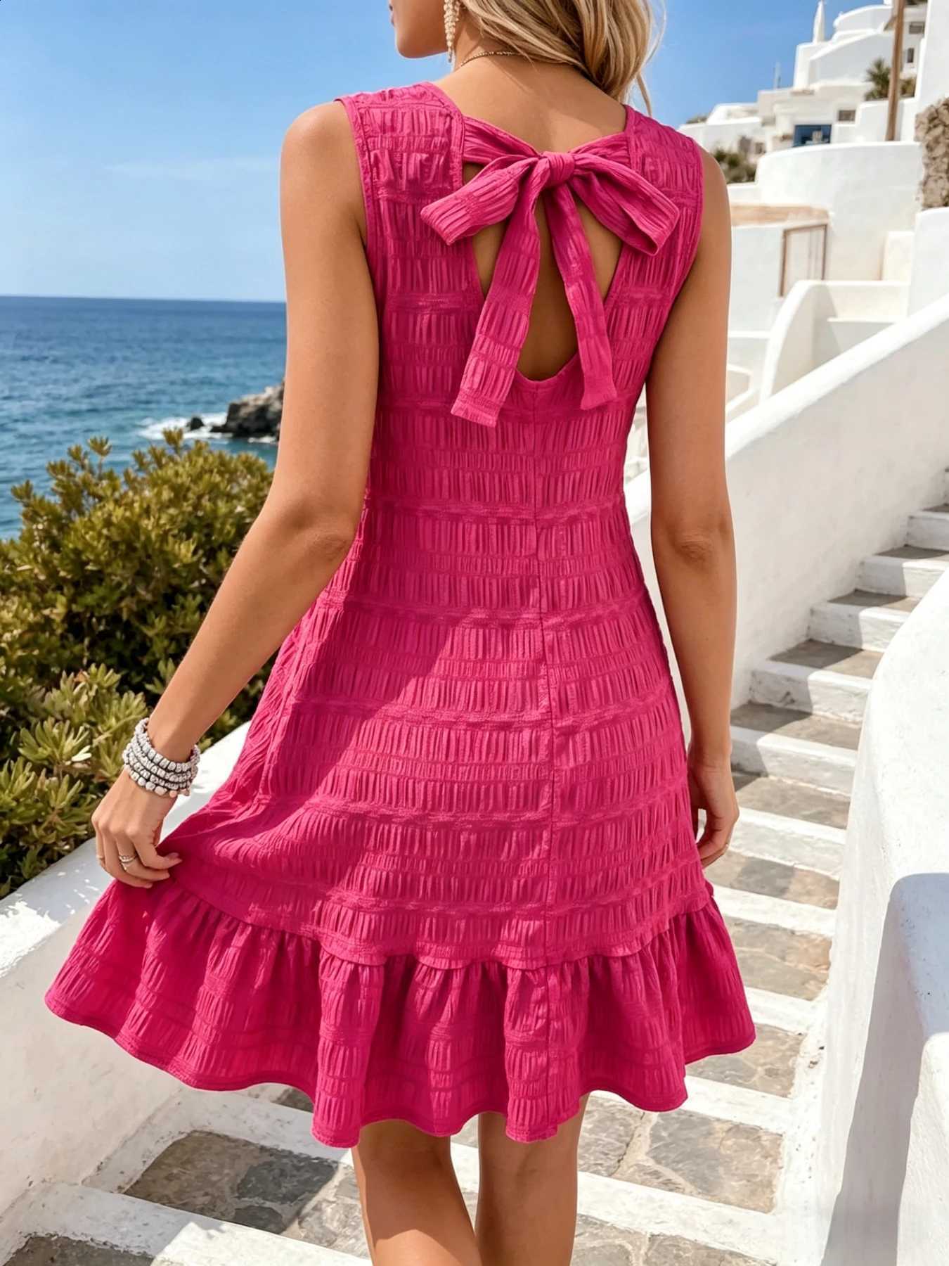 Pink Women's Hot Textured Smocked Sleeveless Mini Dress with Back Bow Tie Ruffle Hem Casual A-Line Sundress for Beach Vacation C260917
