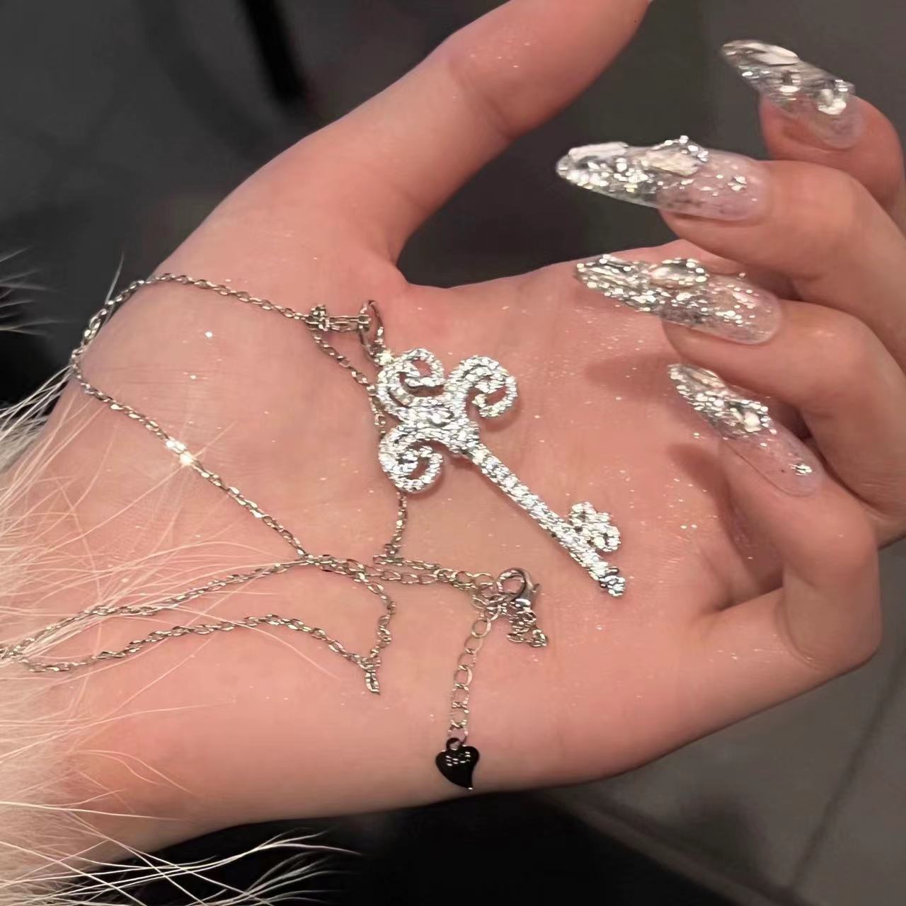 European American style iris zircon necklace, crown key sweater exquisite versatile clavicle chain, with a high-end and unique aesthetic
