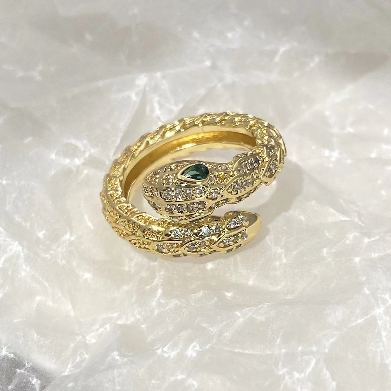 Foreign trade European and American style heavy gold green-eyed bone for women, niche high-end light luxury adjustable open small snake ring