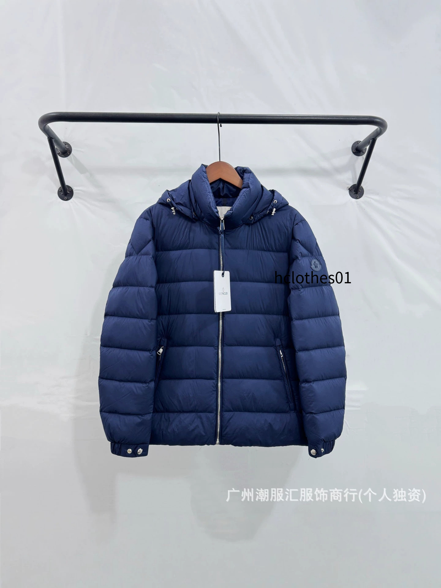 M brand men's hooded down jacket, featuring horizontal quilting, padded arm patches, zipper pocket, drawstring hood, and a casual, warm design