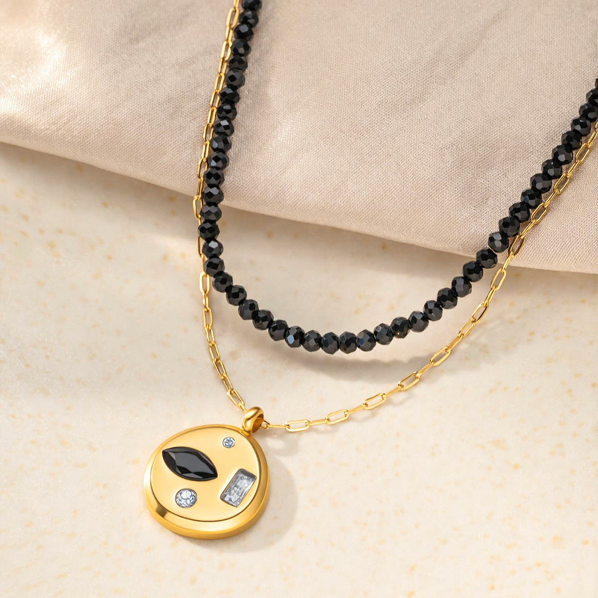 best-selling double-layer black crystal pendant necklace, a lightweight and luxurious retro titanium steel gold-plated clavicle chain, available