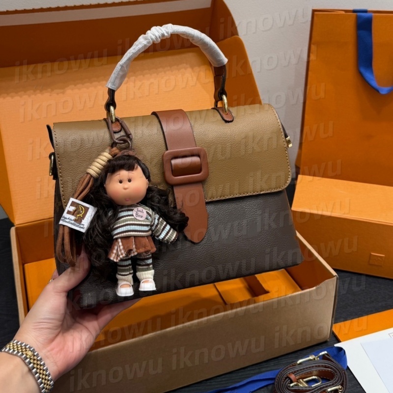 2026 designer's High quality vintage hand-held makeup bag women's fashionable shoulder bag crossbody bags classic vintage flower commuting