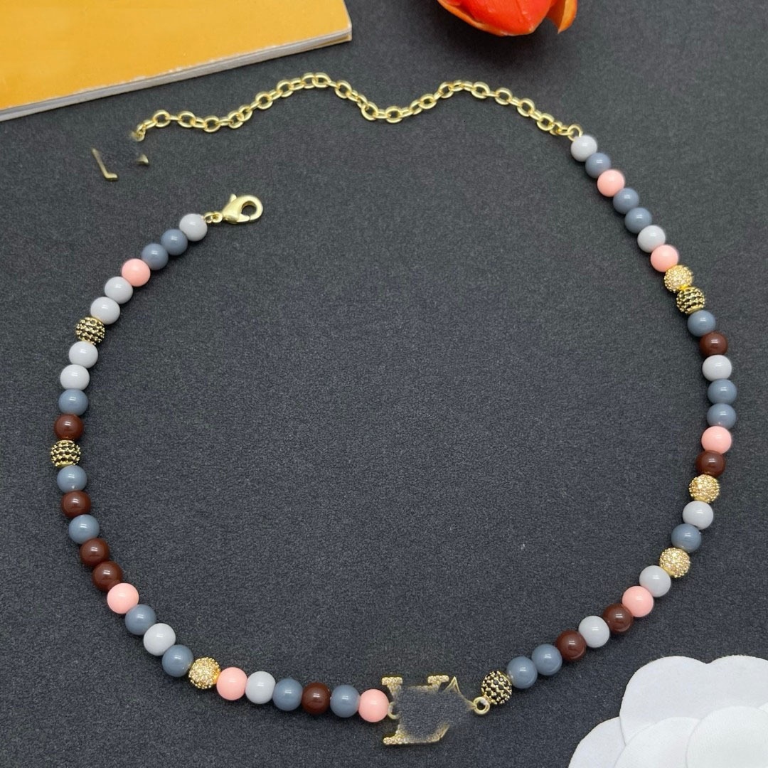 jewellery designer for women Rhinestone V shaped necklace Brass gold plated simple fashionable and versatile small figurine multi colored bead neckl
