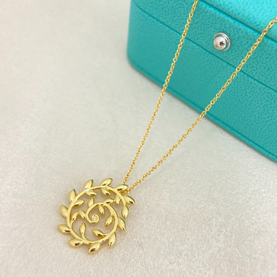 Designer Gold Circular Leaf Pendant Necklace Elegant Nature Inspired Women Jewelry For Daily And Formal Occasions...