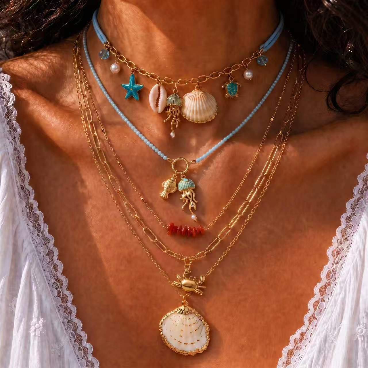 seaside style stainless steel necklace with blue cord, beads, multi-layered shells, starfish, jellyfish, crab, niche accessories for women