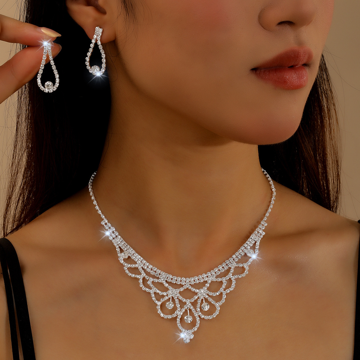 Wholesale jewelry women, including Korean-style accessories, earrings, crowns, wedding necklaces, and decorative sets for newlyweds