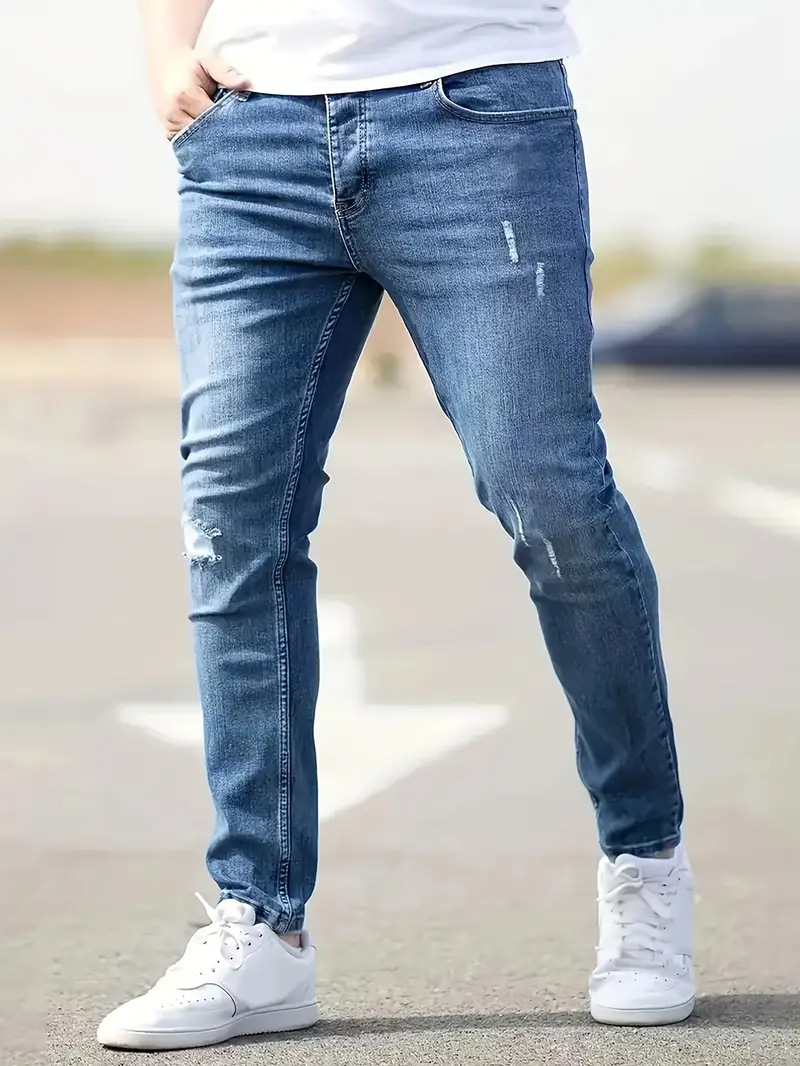 Trendy Slim-Fit Mens Jeanwear: Stylish Skinny Pants With Hole Details for Casual Wear