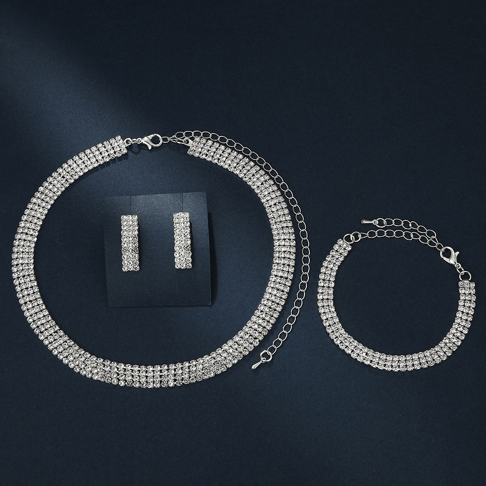 new product hot sale: European American fashion OL bridal jewelry set, featuring a simple four-row rhinestone necklace, earrings, and bracelet