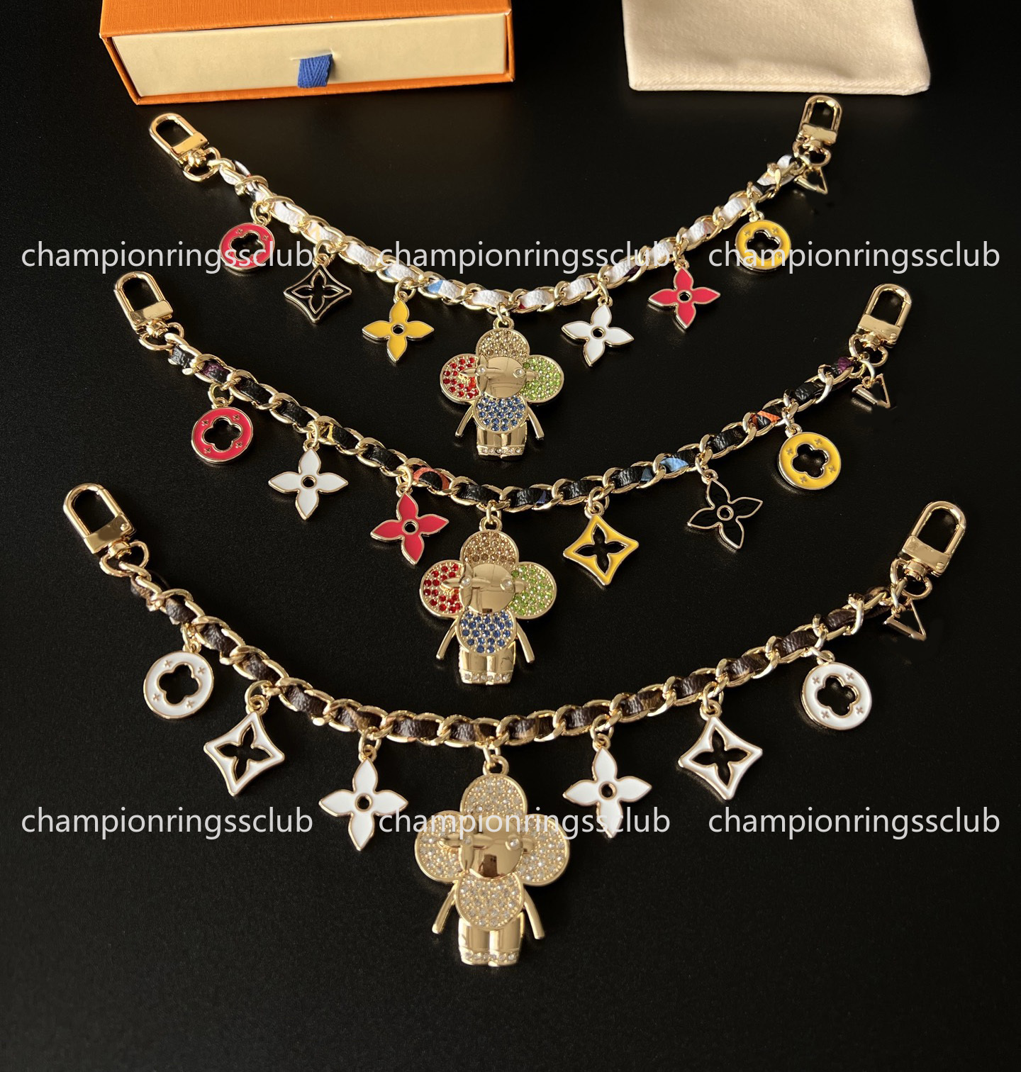 Designer Keychain Lanyards Luxury Leather Clover Bag Charm Sun Flower Lanyards Purse Car Keyring For Women Men Designer Jewelry Bag Accessory Couple