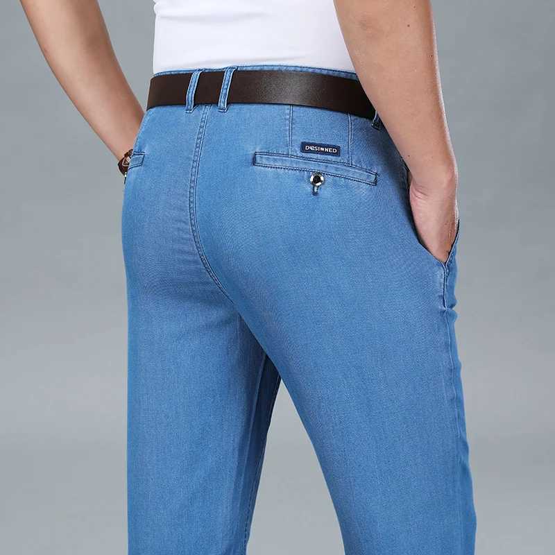 Jeans da uomo 2026 Nuova primavera da uomo Jeans dritti elasticizzati azzurri Business Casual Pantaloni in denim Pantaloni in tessuto modale Marca m