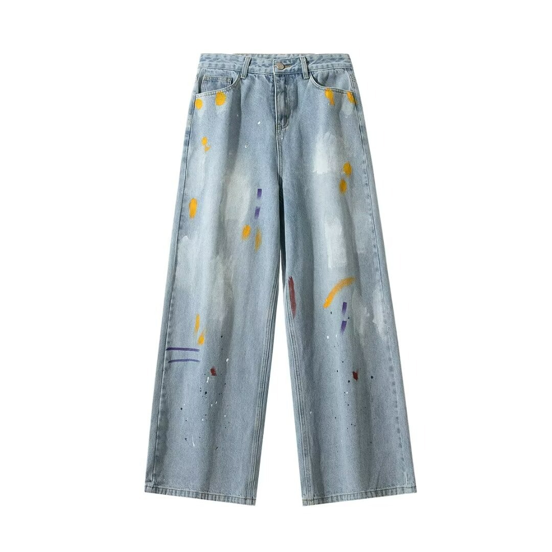Pantaloni da uomo in denim dal design macchiato in stile couture in autunno. Pantaloni larghi, dritti, dalla vestibilità ampia, in stile americano.
