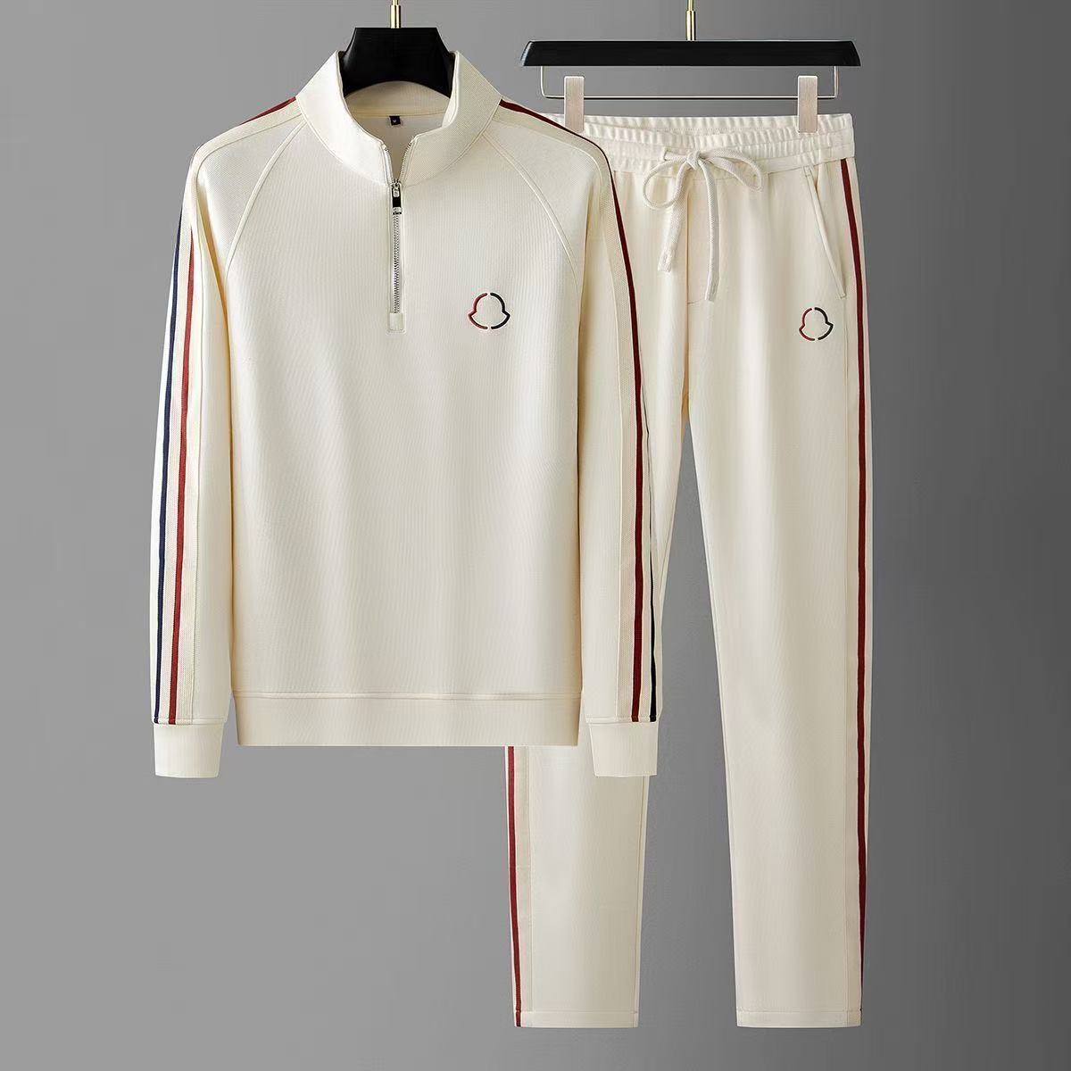 Tute da uomo Nuova collezione 2026: top con mezza zip e colletto rialzato ampio e pantaloni dritti slim a gamba larga color block, set in due pezzi