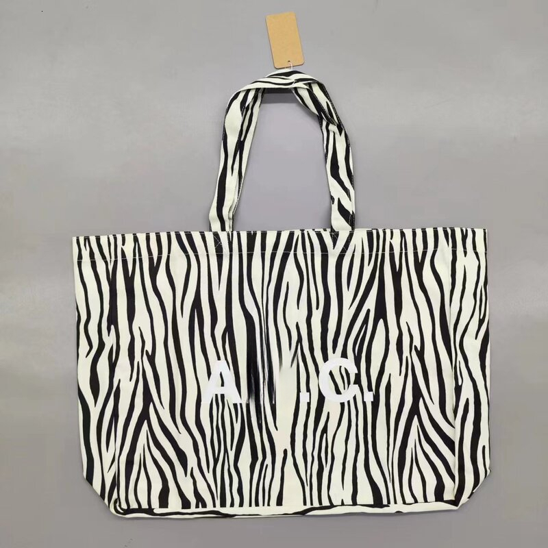 APC Shoulder Tote Bag Designer Bags For Women Supermarket Foldable Canvas Shopping Large Capacity Student Storage Travel 12a Mirror Quality Kids Bag