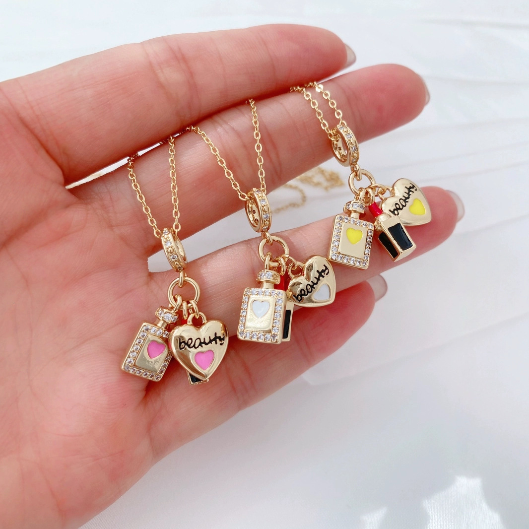 Luxurious Designer Copper-plated 18K Gold Full-diamond Zirconia Droplet Perfume Lipstick Heart Pan's Accessories Pendant