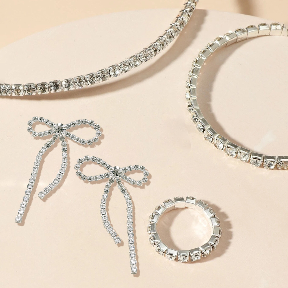 New European American fashion jewelry for sales: Full-diamond shiny bracelet, ring, bow earrings, and light luxury necklace set