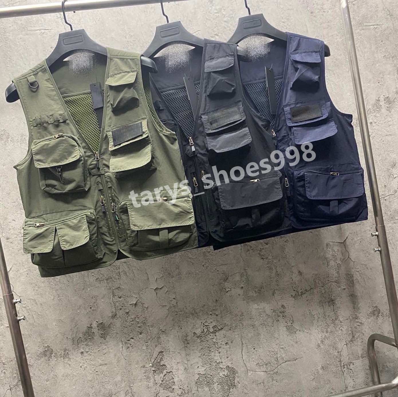 2026 Designer Standones Giacca a vento con cappuccio da uomo Linea riflettente Design Sciolto Bussola per pioggia esterna Cappotto fine Capispalla a