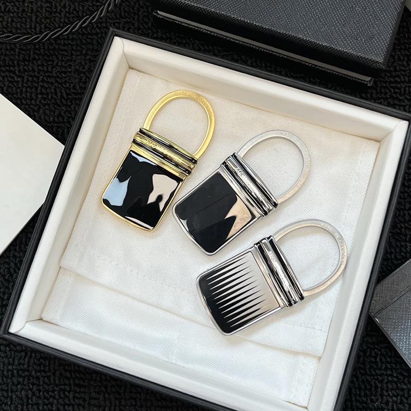 Keychains Lock for woman man Luxury Designer Earring Luxurious Hexagonal White Charms Keychain MB High End Metal Black Elegant