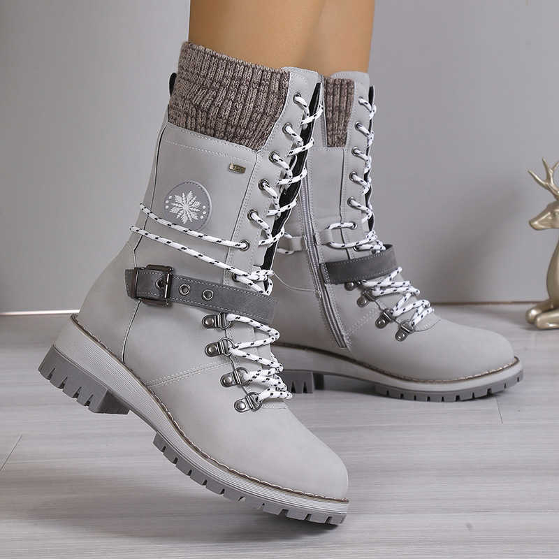Women's snow boots 2023 winter collection featuring a combined leather and fur design thickened for warmth and with a high shaft L26921