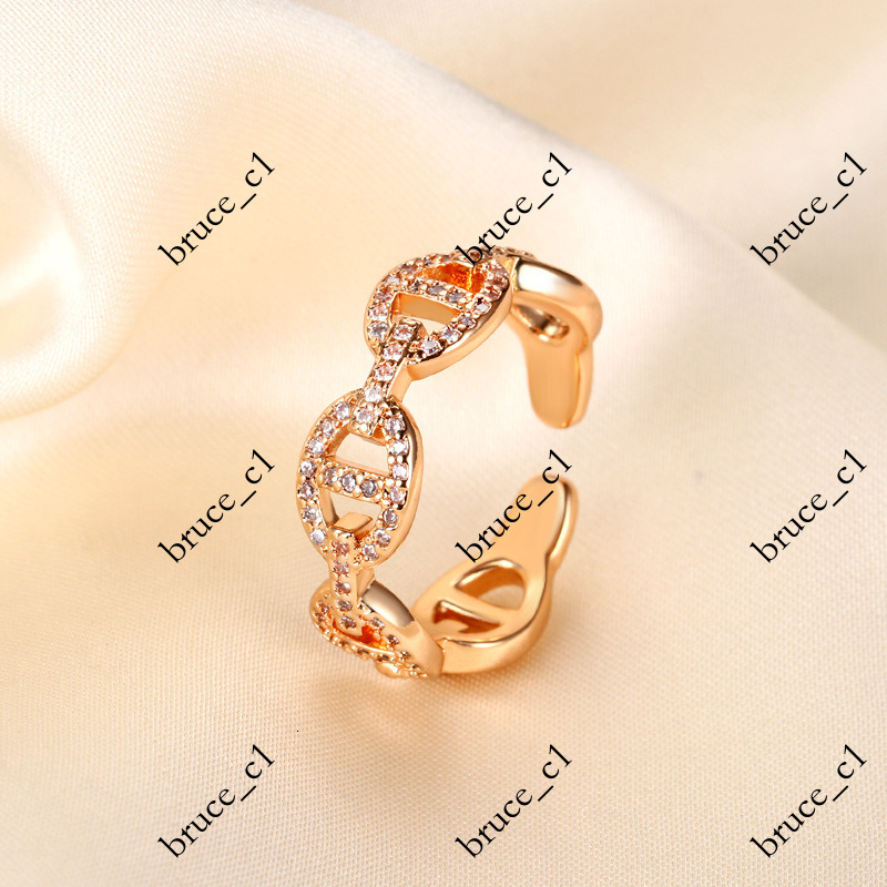 Cross-border real gold-plated heavy-duty full-diamond pig nose for women, European and American light luxury, stylish, unique, niche index finger ri