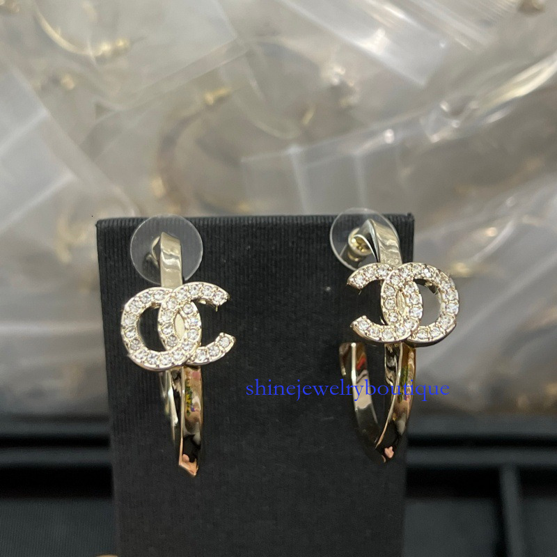 cc earrings full diamond twisted earrings fashionable and versatile light style silver needle stud earrings