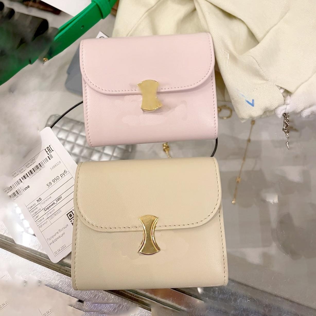 Luxury leather twist clasp short trifold wallet Designer Small simple CardHolders Mens Womens Lightweight portable CoinPurses Summer Outdoor Fashion
