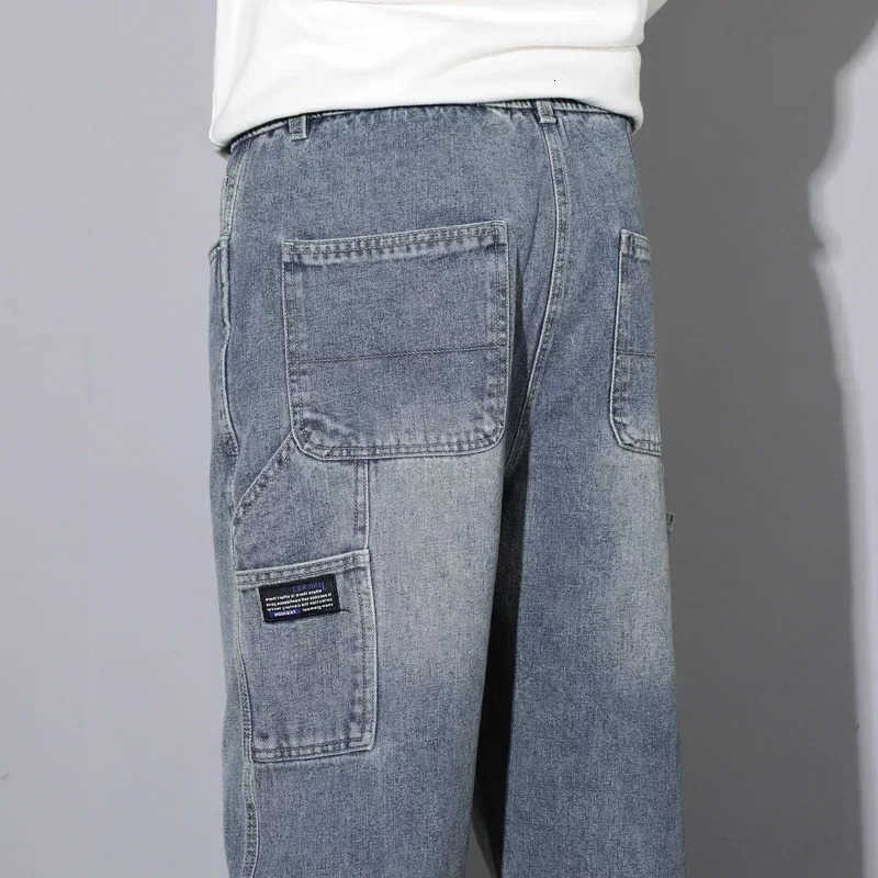 Jeans nuovi uomini autunno jeans da uomo strada hip-hop larghi dritti multi-tasche da lavoro pantaloni in denim larghi pantaloni casual con giunture