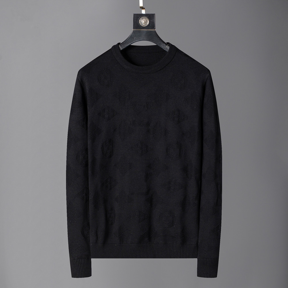 This high-quality designer men's knit sweater features a solid color combined with a letter graphic design; this warm, long-sleeved sweater ble
