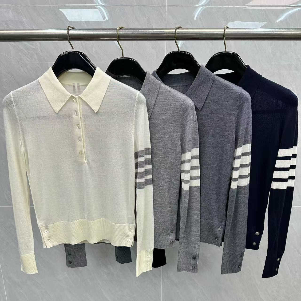 Merino wool polo shirt with four stripes a casual and versatile long-sleeved knit for both men and women T260922