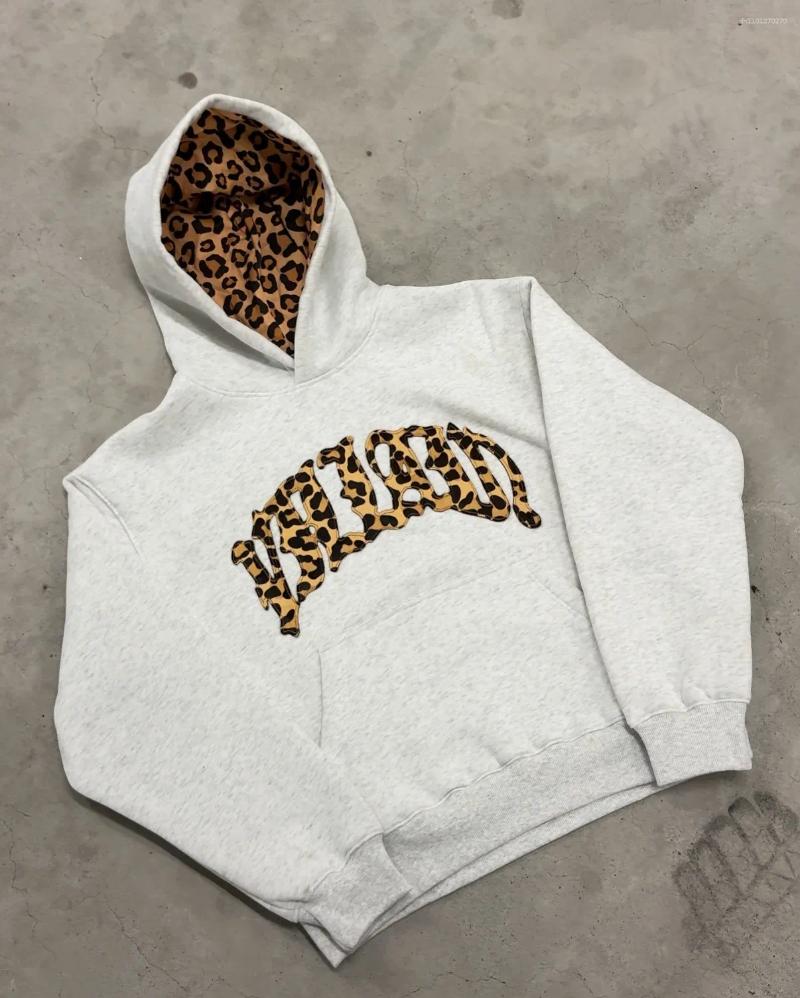 Set coordinati personalizzati per pantaloni felpa con cappuccio da uomo e da donna con stampa leopardata streetwear