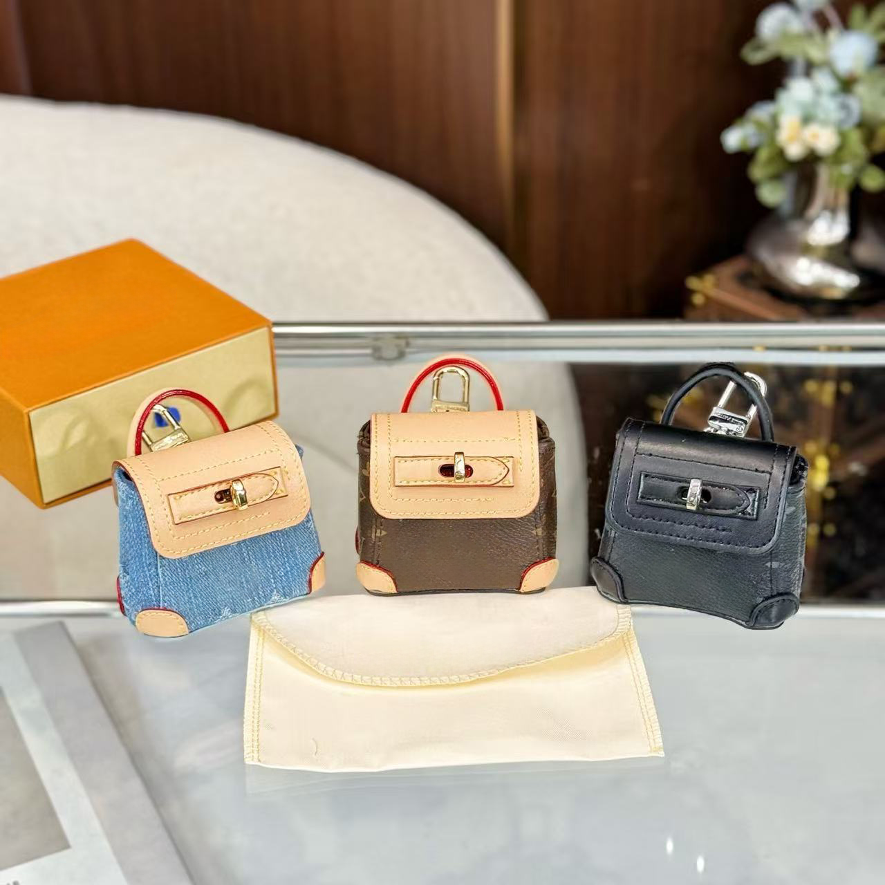 Mini Steamer Bag Charm designer mini handbag Earphone Bag women charm keychain purse luxury Cowhide leather Monogram coated canvas Bag charm M04348