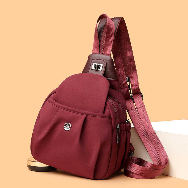 Stile 2025 Zaino da donna di moda Zaino in nylon Borsa a tracolla da viaggio leggera di grande capacità Borsa a tracolla casual Borsa multi-tasca pe