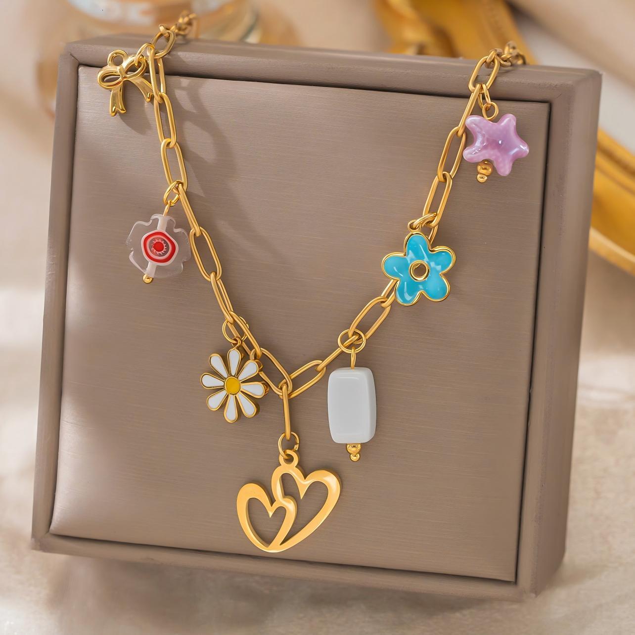fashion stainless steel 18k gold-plated waterproof necklace for women with enamel flower, star, and heart pendants, collarbone chain