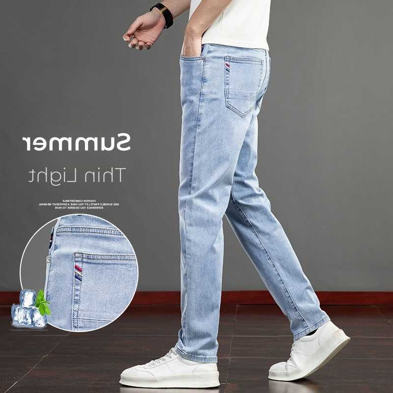 Jeans da uomo primavera estate jeans da uomo sottili moda coreana elastici slim dritti business casual pantaloni in denim classici pantaloni maschil