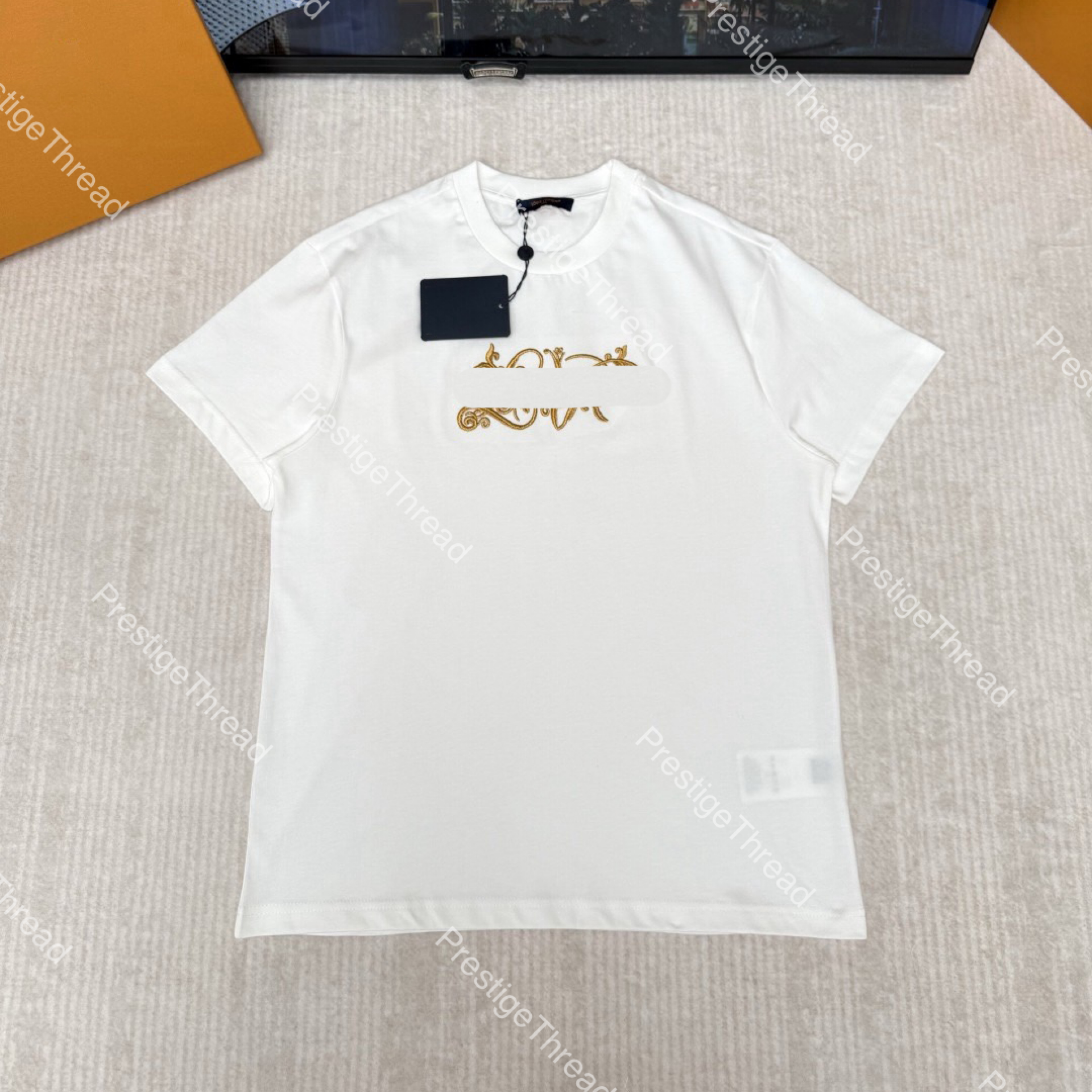 Versatile light luxury short sleeved summer printed T-shirt, loose men's and women's round neck casual outerwear trend