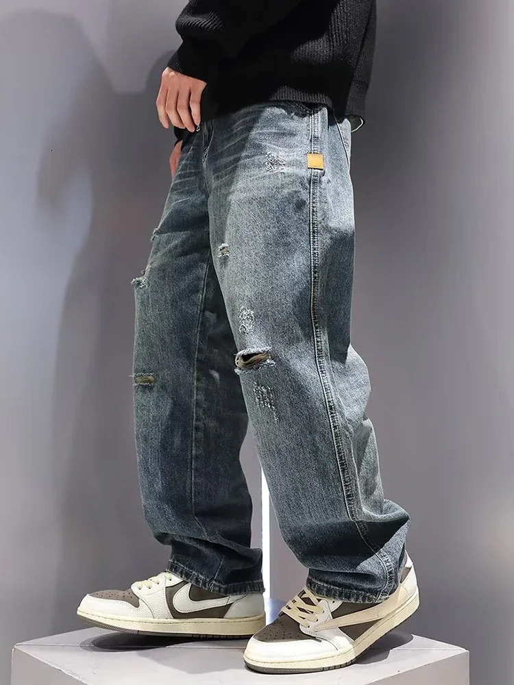 Jeans strappati larghi da uomo Moda Hip Hop Hole Streetwear Pantaloni lavati effetto consumato Pantaloni dritti larghi in denim americano 260922