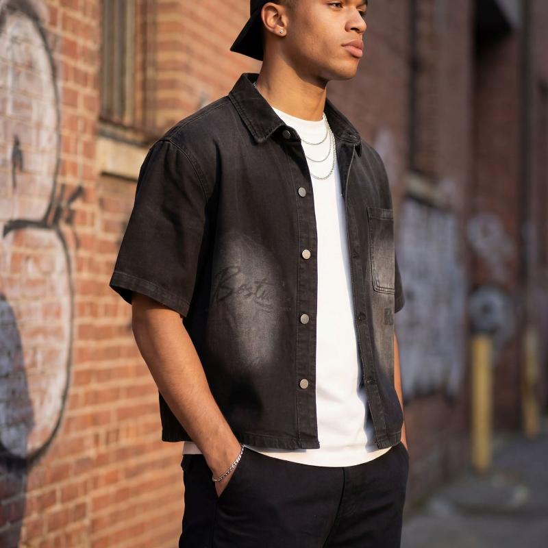 Men Loose Fit Cropped Short Sleeve Denim Shirt Vintage Faded Black Tone Letter Graphic Print Turn Collar Button Up Chest Pocket