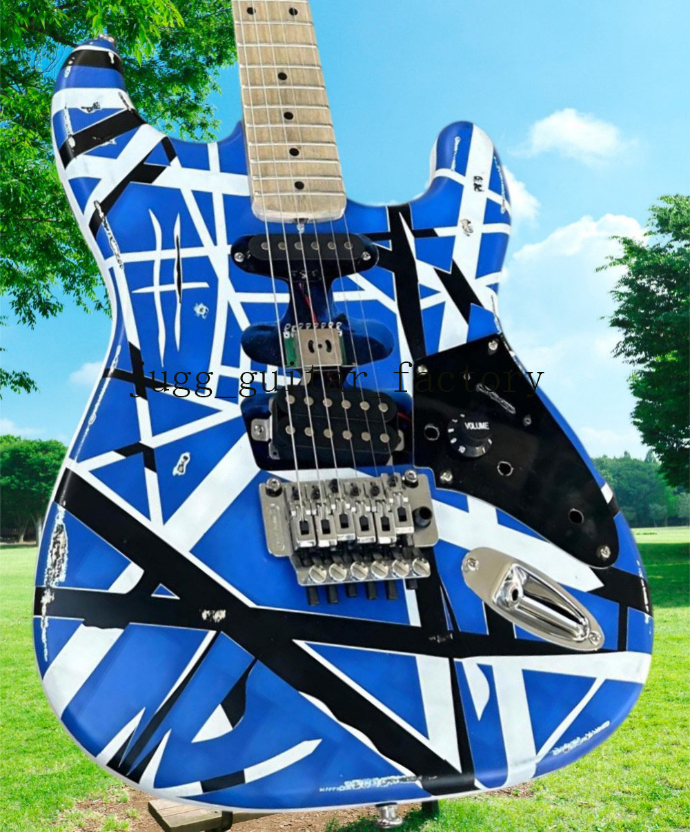 hot-Heavy electric guitar, red body, black and white striped trim, free shipping