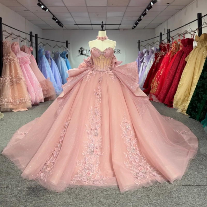 Abiti stile Quinceanera con glitter rosa Abito da ballo con spalle scoperte Abito dolce 16 Abito con perline di fiori con fiocco Tull Corsetto Festa