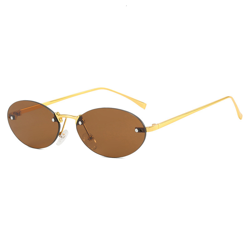 Luxury Fashion Designer Sunglasses Oval Rimless Rivet 2024 New Fashion European And American Trend Street Style Sunglasses For Women