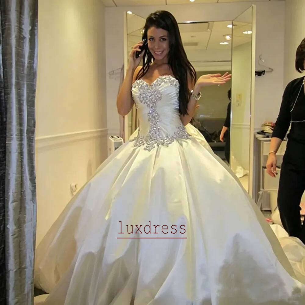 Ivory Bling Pnina Tornai Ball Gown Dresses Sweetheart Sparkly Crystal Backless Chapel Train Bridal Cheap Wedding Gowns