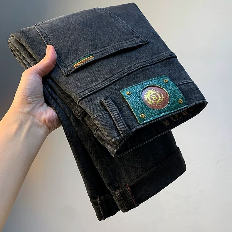 New High End Black Denim Pants Men Featuring A Trendy Stretchy Slim Fit Tapered Design Perfect For Casual Wear In Autumn And Winter Luxury