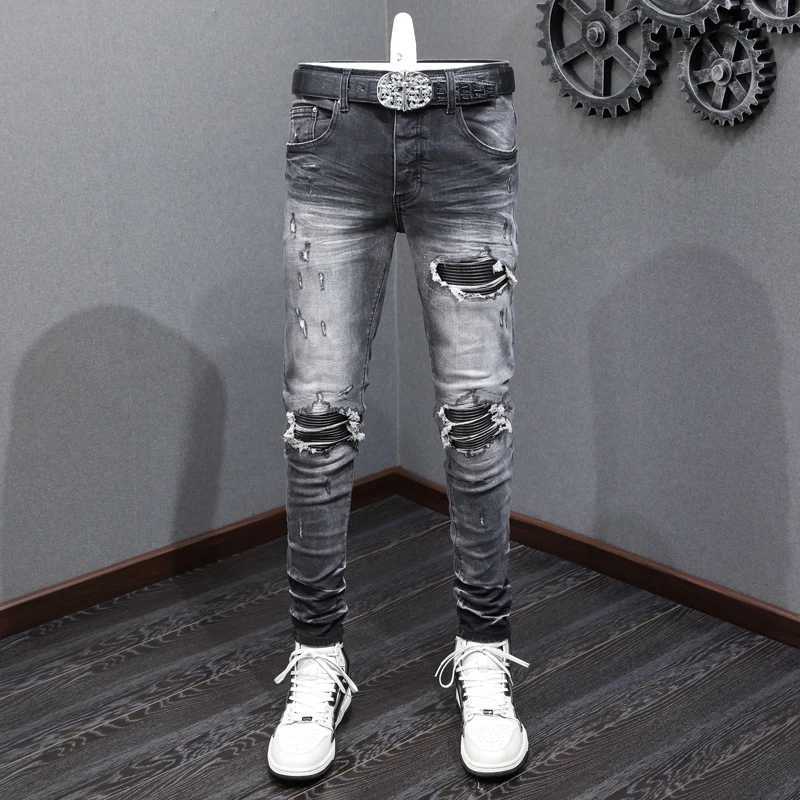 Fashionable new men's jeans perforated black leather patch washed nostalgic black jeans designer high street hip-hop brand pants S260924R3R2