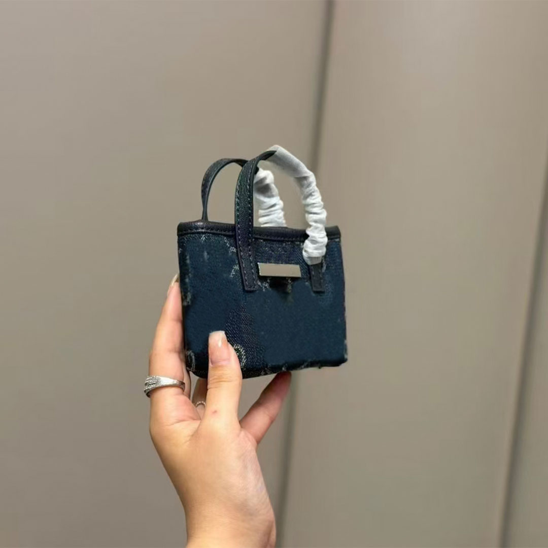 Designer Women's Retro Letter Mini Handbag Canvas Mini Handbag Portable Earphones Coin Wallet Small Top Handbag Multi Color Fashion Key Bag